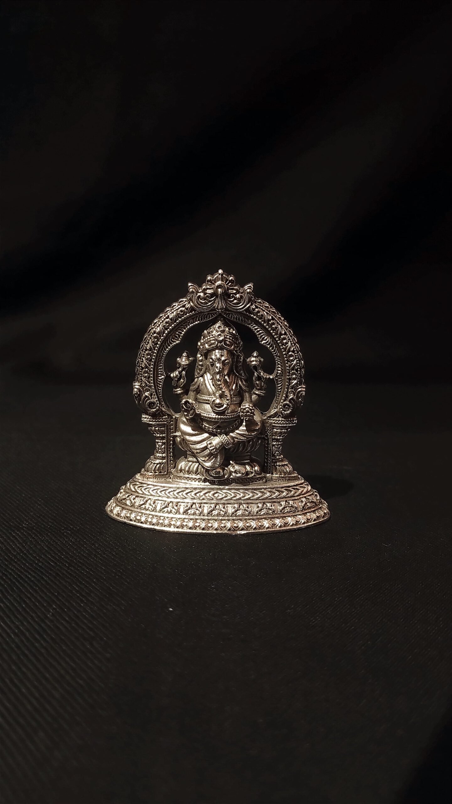 23L3505 Exquisite Pure Silver Lord Ganesha Idol with Ornate Prabhavali Arch – Handcrafted Vinayagar Statue for Puja Mandir & Auspicious Gifting - Image 1